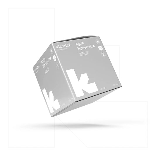 Caja de 100 unidades de agujas hipodérmicas estériles Klinetix. Envase profesional con certificaciones ISO y CE, diseñado para un solo uso. Producto médico esencial para administración de soluciones y extracciones.